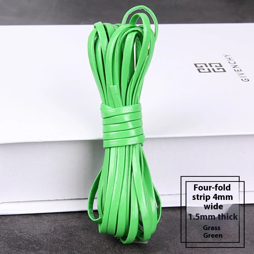 Coiled PU leather woven craft string in multiple colours including beige, black, red, blue, green, gold, and silver.