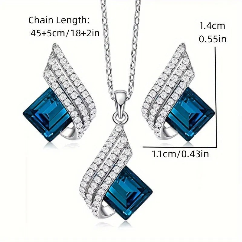 Women's alloy and glass cross chain necklace with matching electroplated stud earrings jewellery set