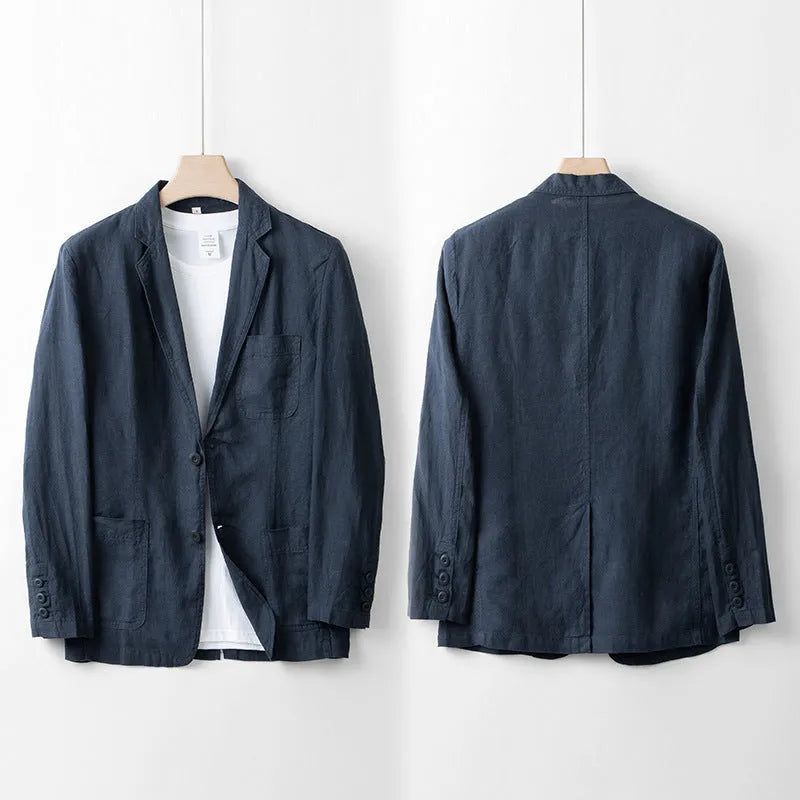 Men's casual linen suit jacket in a solid colour on a hanger, showing long sleeves and loose fit.