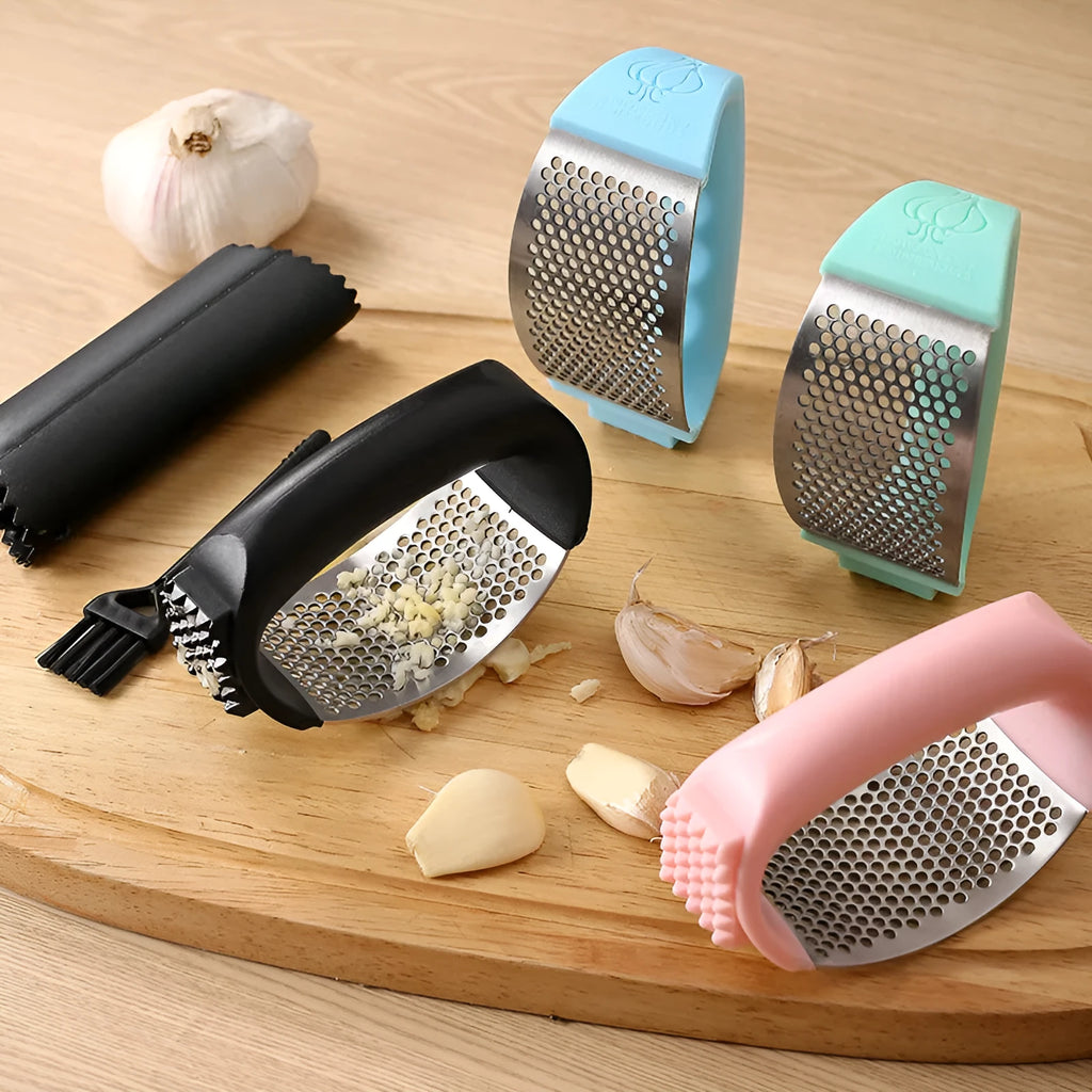 304 stainless steel garlic press in modern design with 11cm by 7cm dimensions