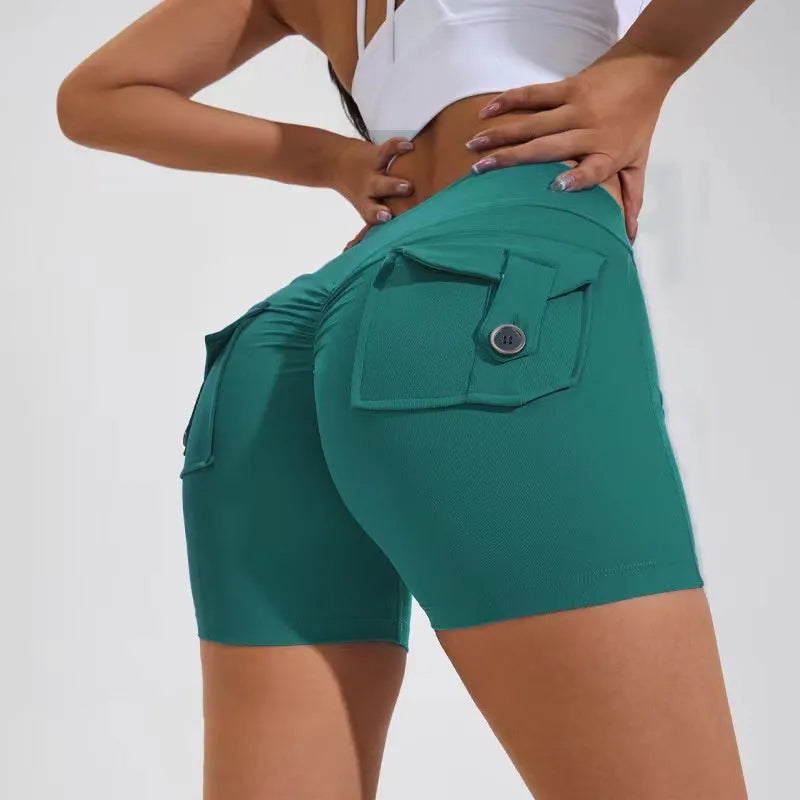 Women's high waist hip lifting shorts with pockets in various colours for fitness activities