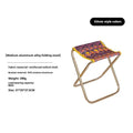 Black aluminium alloy folding camp stool with ethnic pattern, shown in folded and open positions.