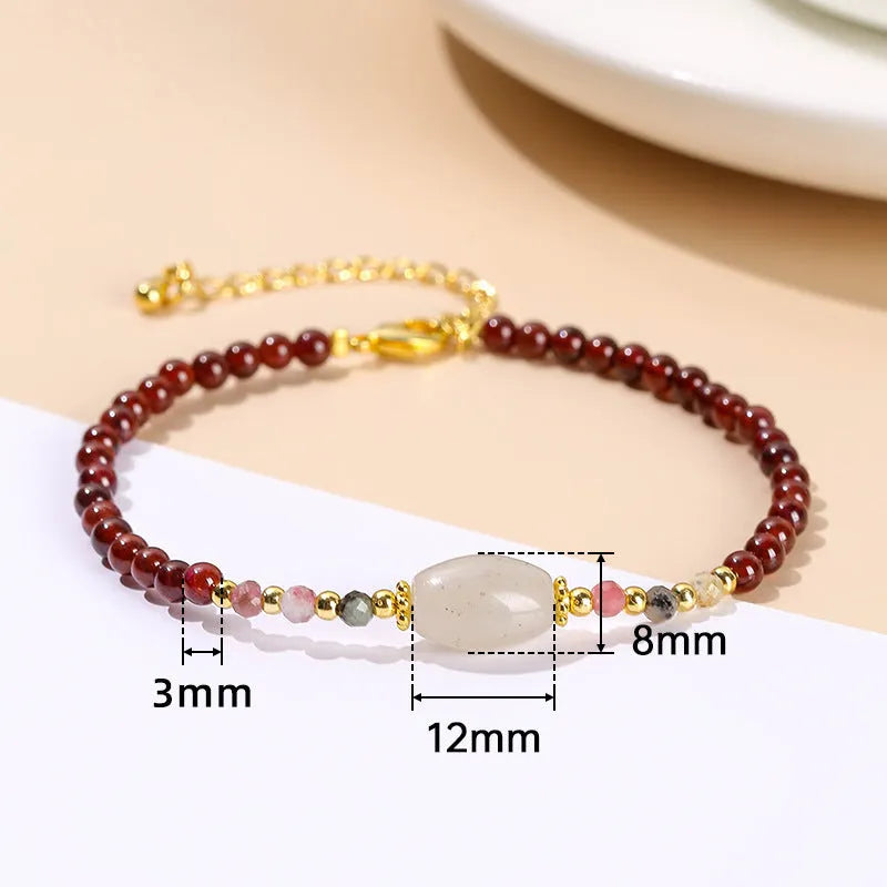 Handmade crystal agate bracelet with natural gemstone beads and a decorative charm