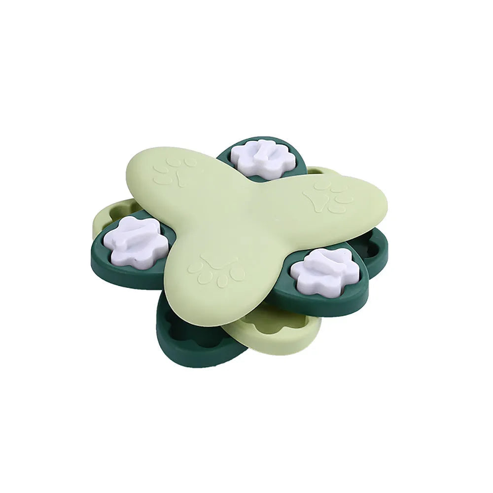 Green and yellow dog puzzle toy with rotatable compartments and bone-shaped covers