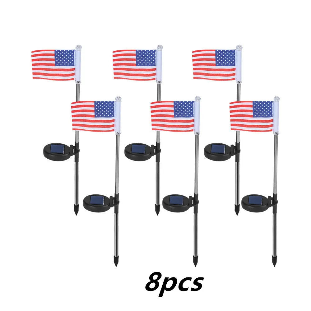 Solar-powered garden flag light with stainless steel pole displaying American or British flag design