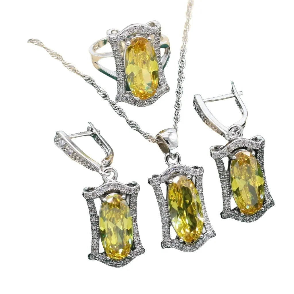 Women's zircon dinner jewellery set with necklace, bracelet, earrings, and ring in yellow or olive green colours