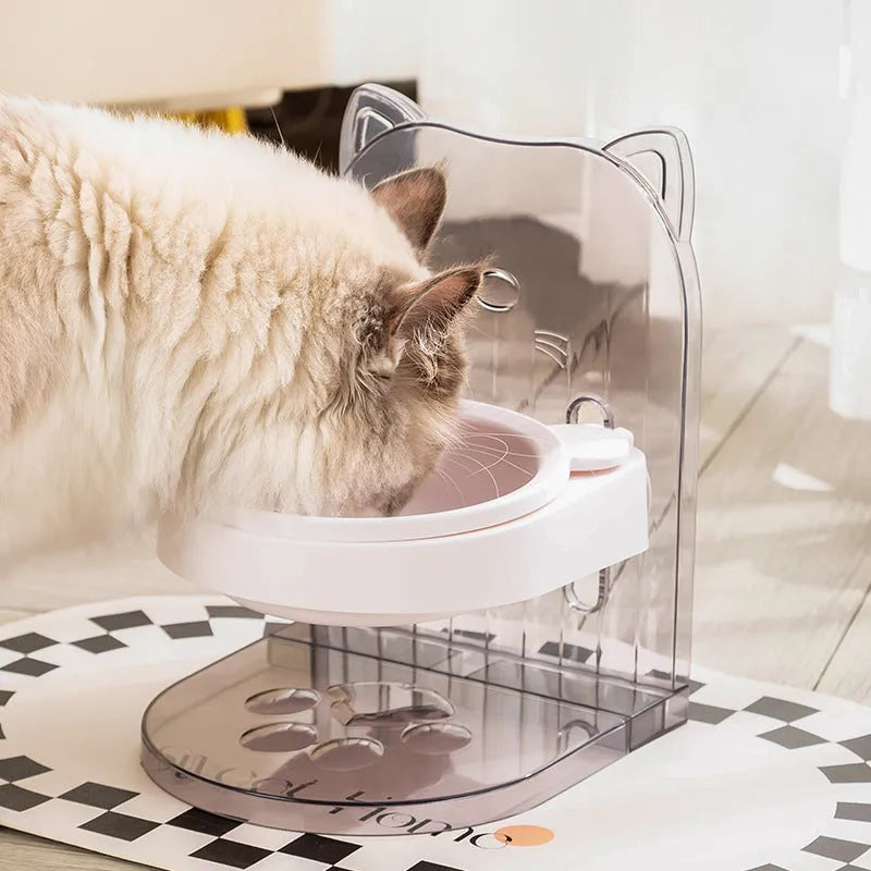 Grey adjustable height cat feeding bowl with cat ears and removable cage on a white background.
