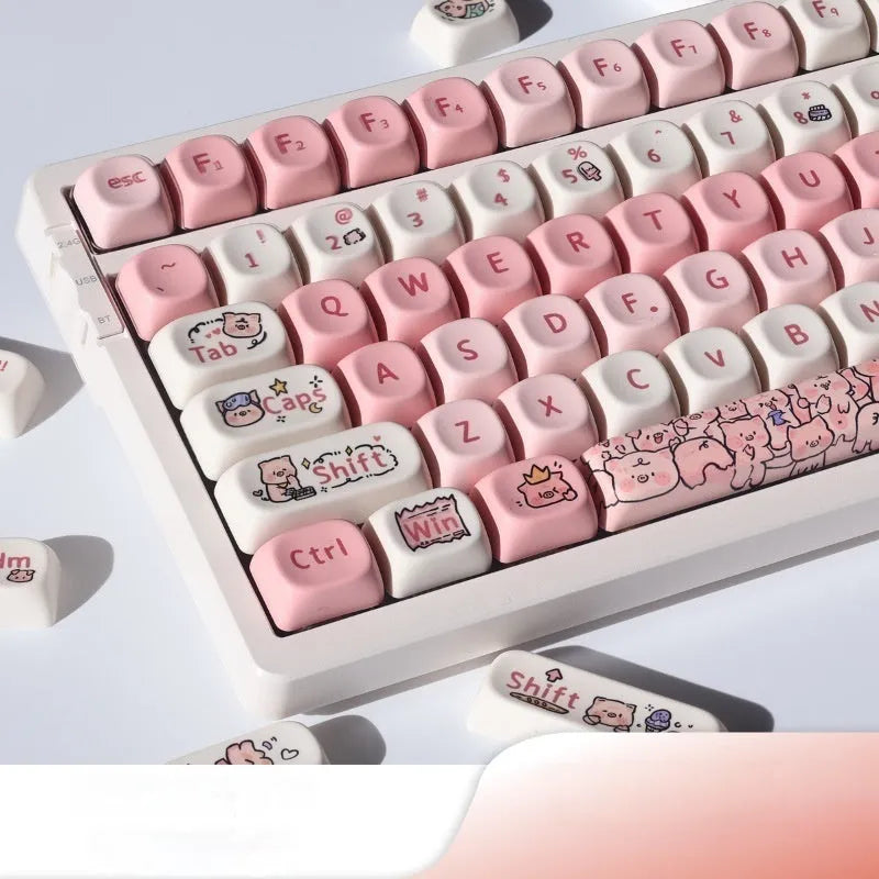 Pink PBT key cap set with a colourful fragrant pig character design on a keyboard.