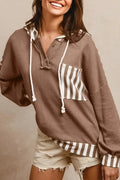 Straw yellow waffle texture hoodie with patchwork stripes, drawstring hood, and button neck detail