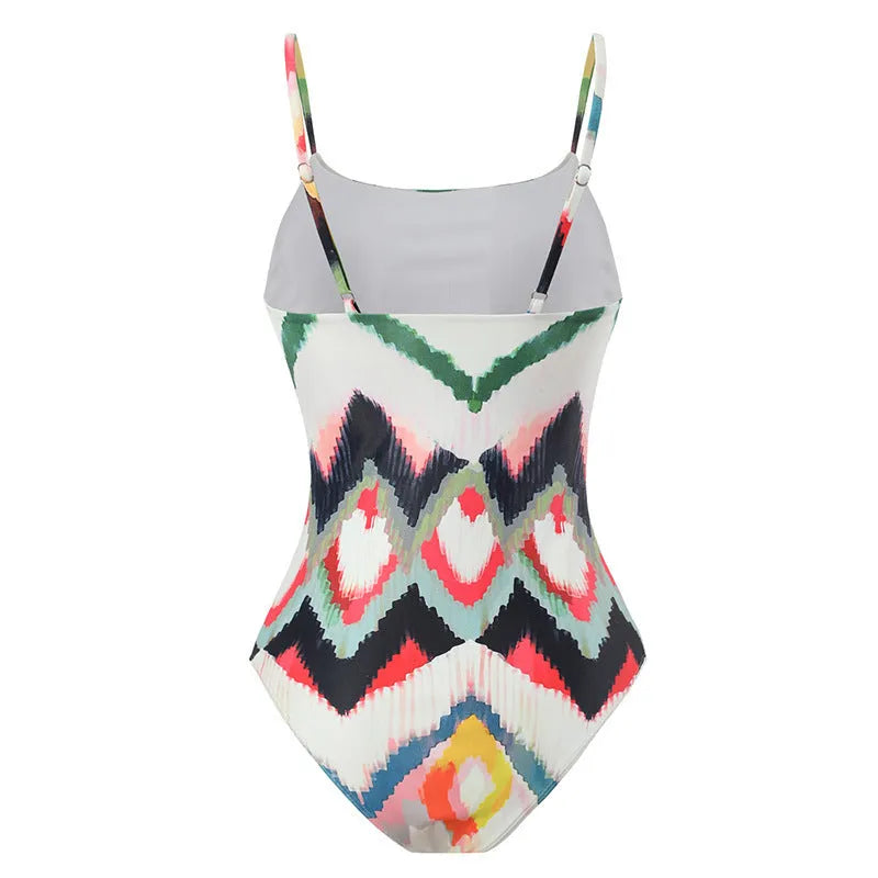 Women's two-piece swimsuit set with matching hip skirt in striped and gradient patterns