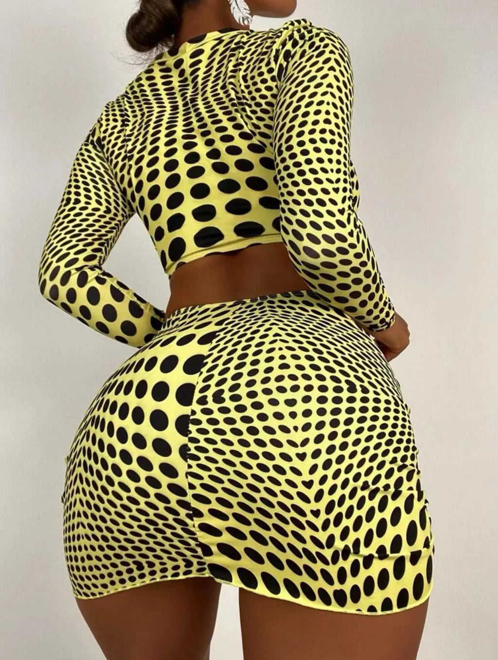 Women's green polka dot swimsuit three-piece set showing top, skirt and bra components