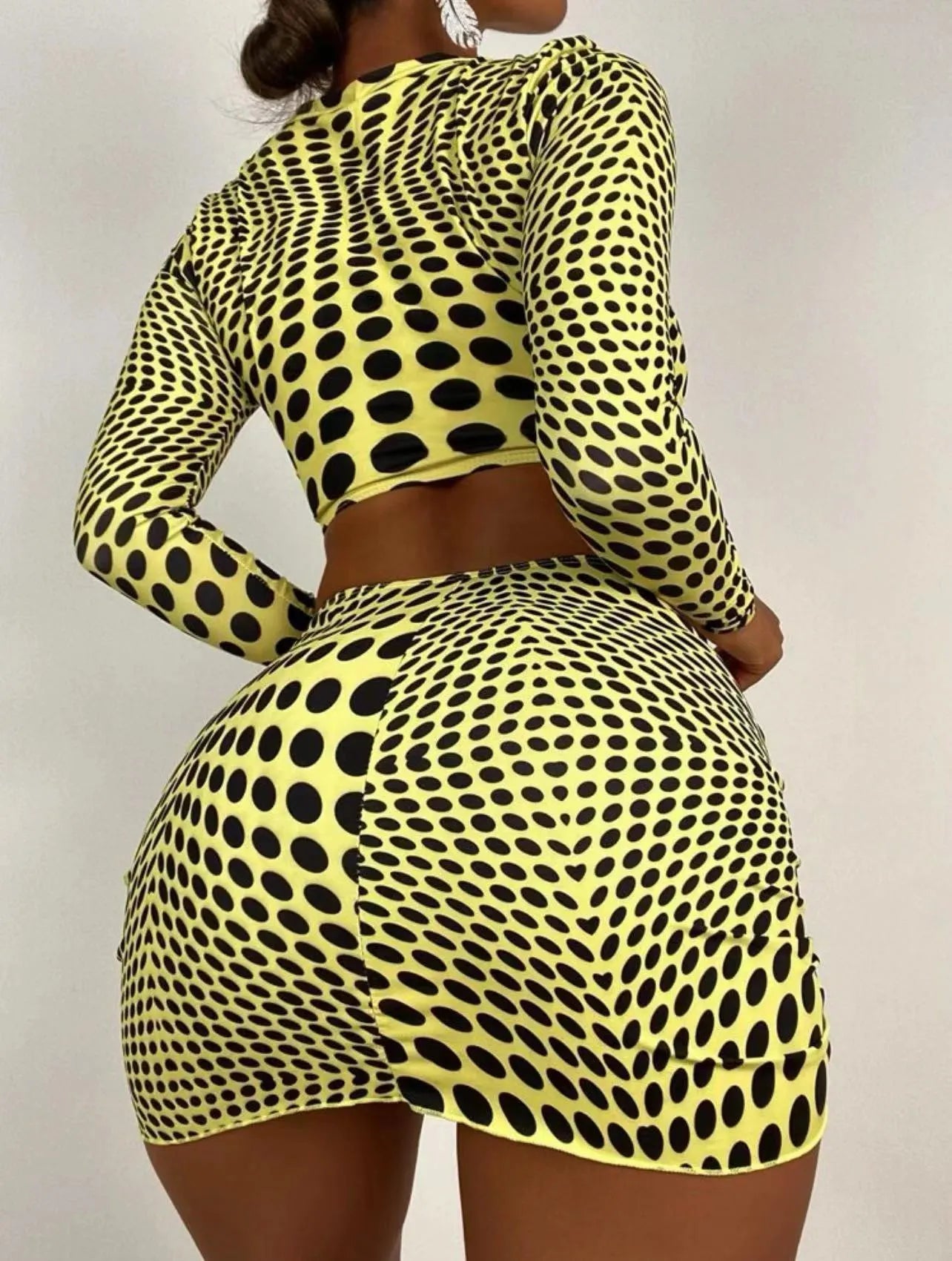 Women's green polka dot swimsuit three-piece set showing top, skirt and bra components