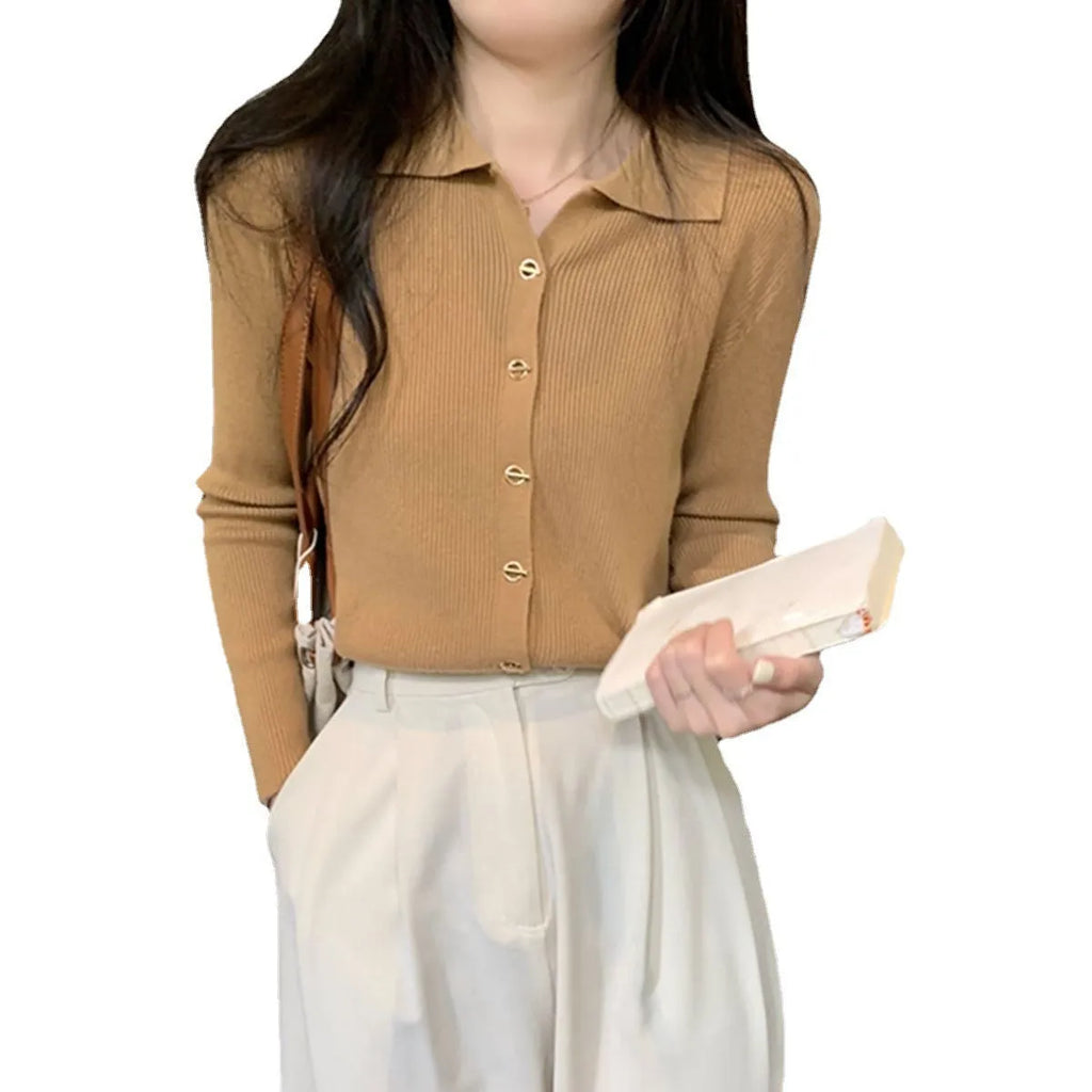 Beige viscose knitted long-sleeved cardigan with loose fit design on hanger