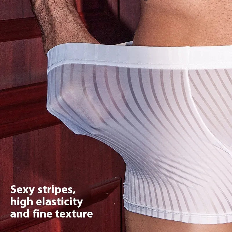 Men's vertical stripe boxer briefs in black nylon fabric showing stretch and pattern detail