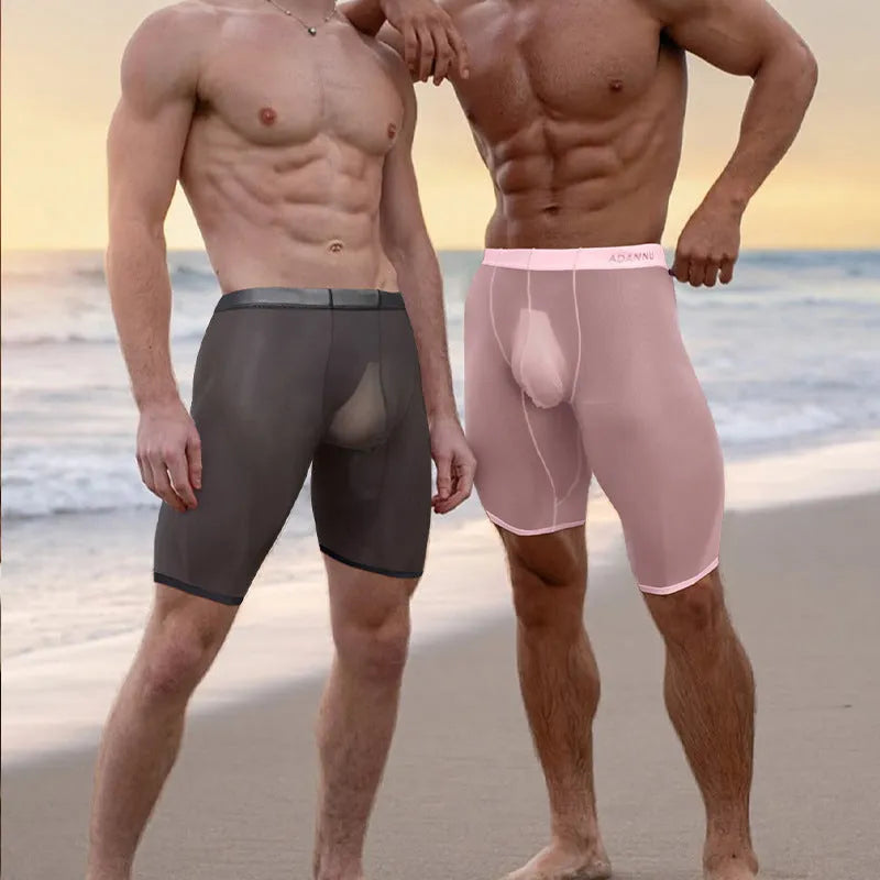 Men's solid colour mesh home shorts in black, showcasing seamless knitted construction and a casual fit.