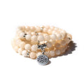 A vintage-style women's bracelet made from natural stone with a geometric lotus design.