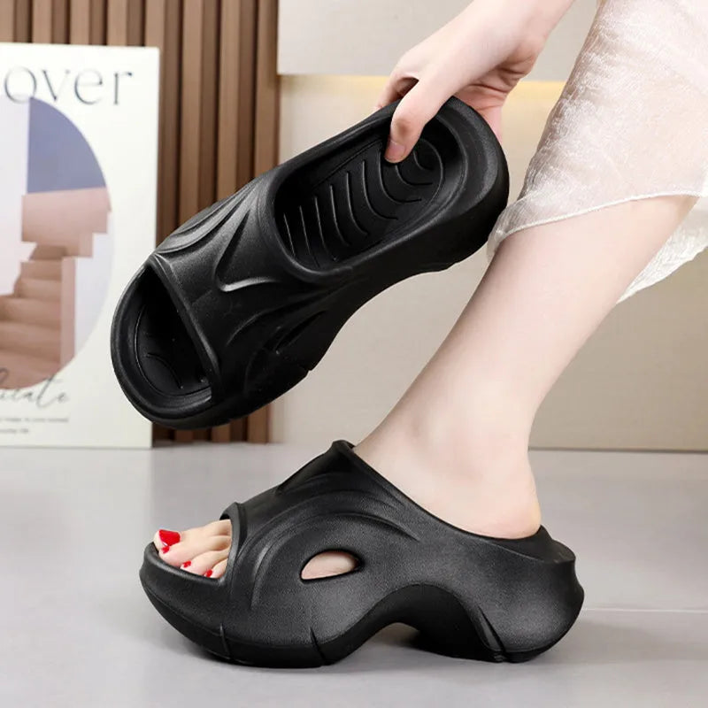 Women's thick-soled round-toe EVA slippers in rose red colour on a white background.