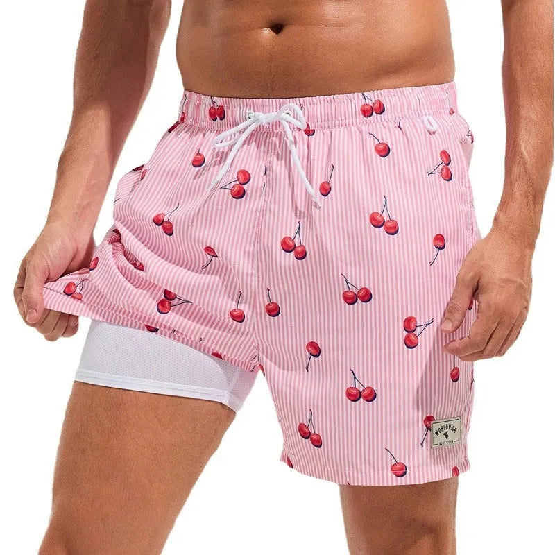 Men's loose quick-drying swimming trunks in floral pattern with boxer-style cut