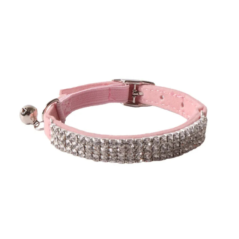 Soft flocking cat collar with an elastic buckle shown in one of six available colours.