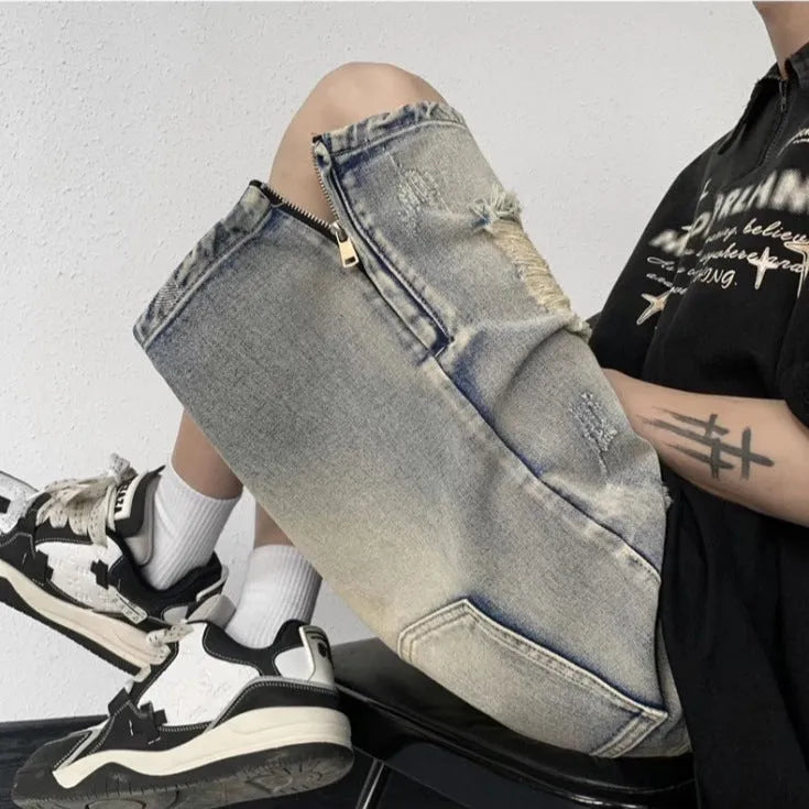 Blue retro-style denim shorts with a wide-leg, loose fit on a person.