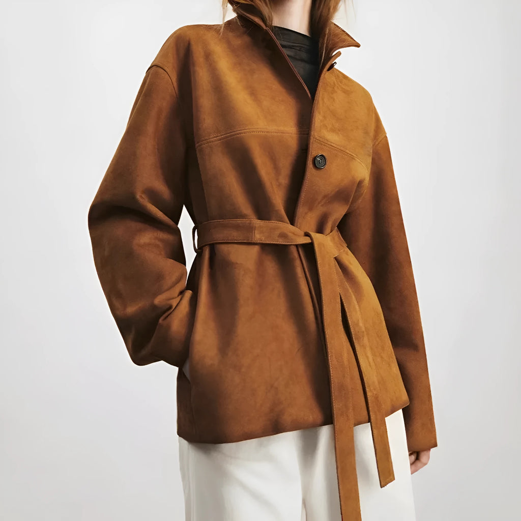 Women's retro style cashmere coat with Peter Pan collar and leather stitching details in loose fit mid-length design