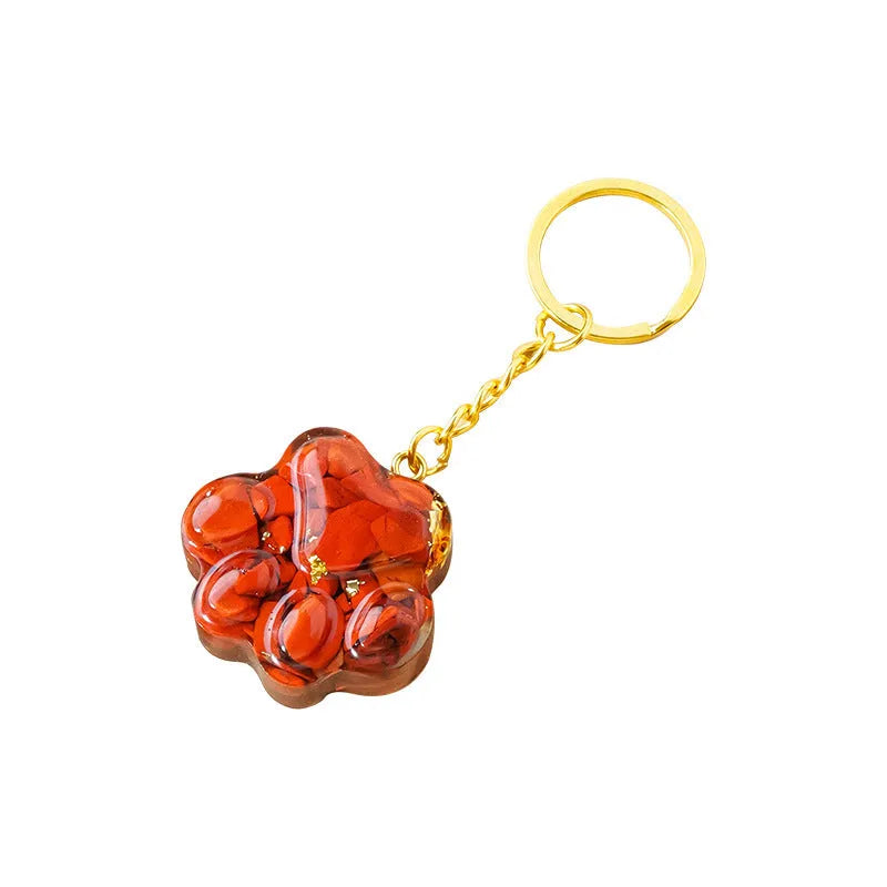 Natural crystal cat's paw keychain pendant on a metal ring in one of ten random stone colours.
