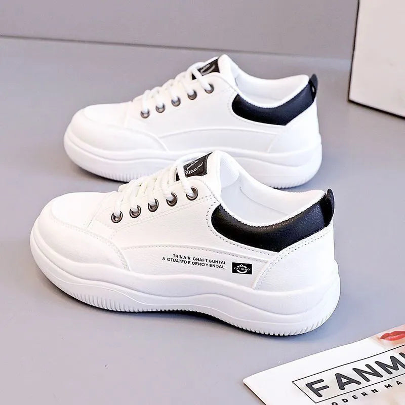 Women's white Korean-style lace-up pumps with cross strap detail and flat 3-5cm heel
