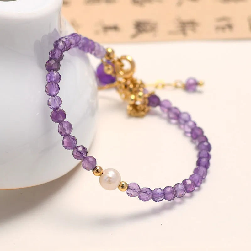 Purple amethyst crystal Chinese style women's bracelet with diamond-shaped centrepiece and electroplated metallic components