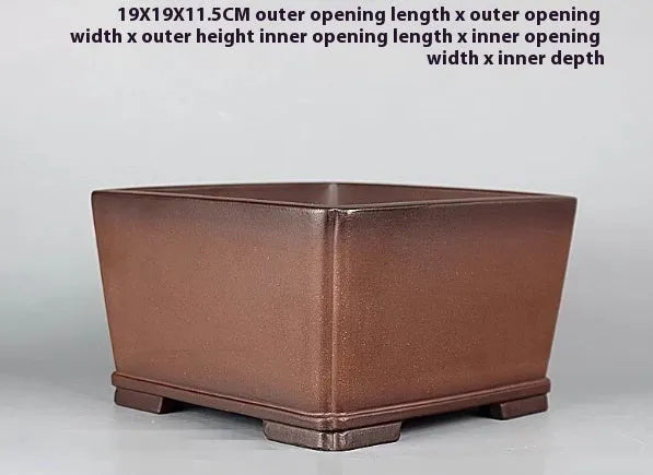 Brown handmade purple clay flower pot with classical antique design
