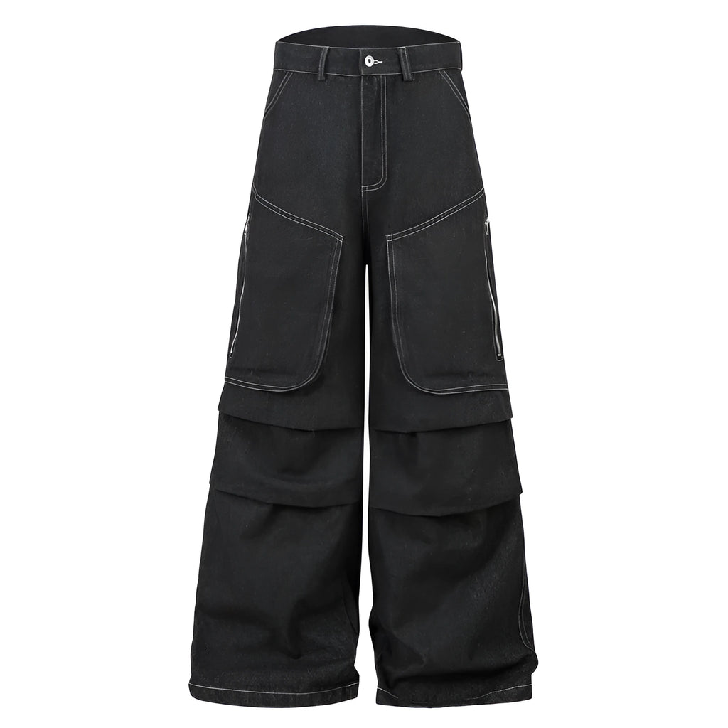 Black pleated mid-waist cotton denim jeans with multi-pocket workwear style on a hanger.