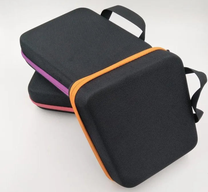 Red EVA cube bag with 30 pockets for 15ml essential oil bottles, shown wall-mounted.