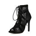 Black suede women's lace-up high heel shoes with an 11.5 cm heel on a plain background.
