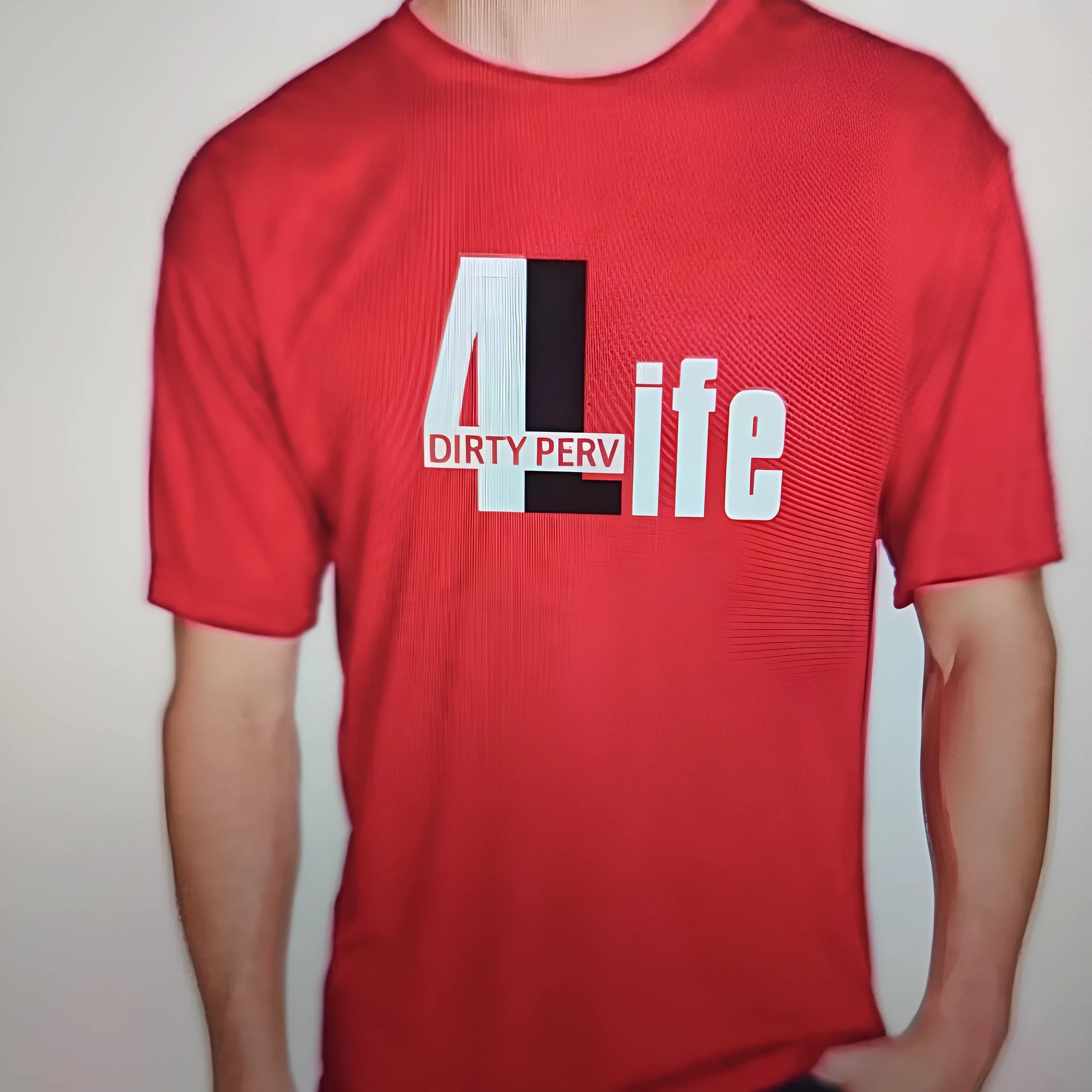 A red men's loose-fit cotton T-shirt on a hanger, showing the round neck and short sleeves.