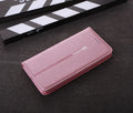 Black PU leather wallet case open to show iPhone slot and credit card holders