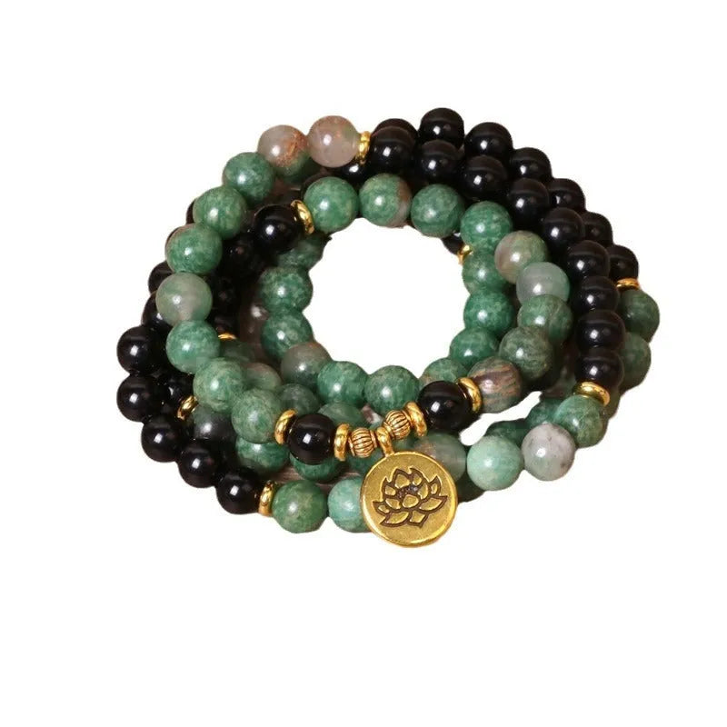 Green and black elastic beaded alloy bracelet with natural style design