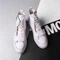 Men's black and white PU leather ankle boots in high-top sneaker style for winter