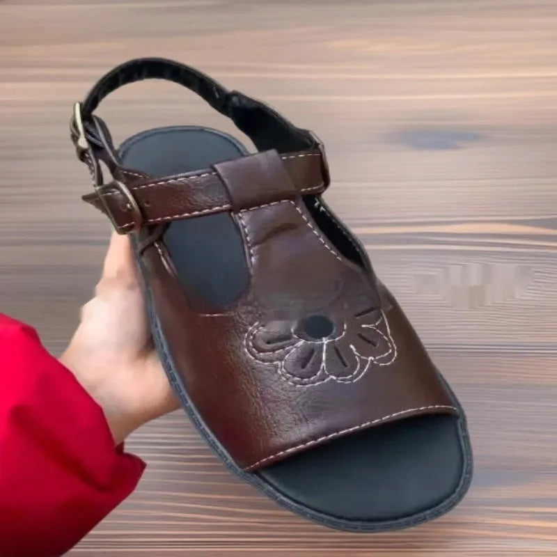Men's black embroidered beach sandals with floral pattern and flat heel