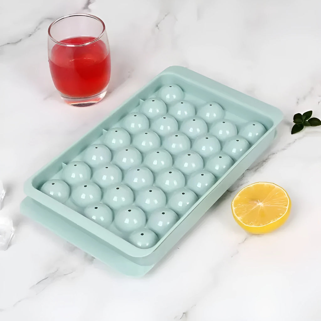Blue PE ice cube tray with lid showing 33 round moulds.