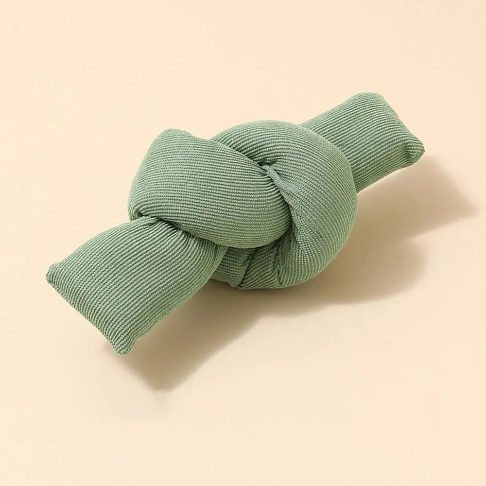White natural cotton dog rope toy with sturdy knots for tug of war and chewing play