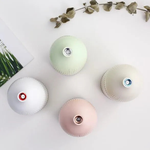 White 300ml ultrasonic aromatherapy diffuser with LED lights and USB cable