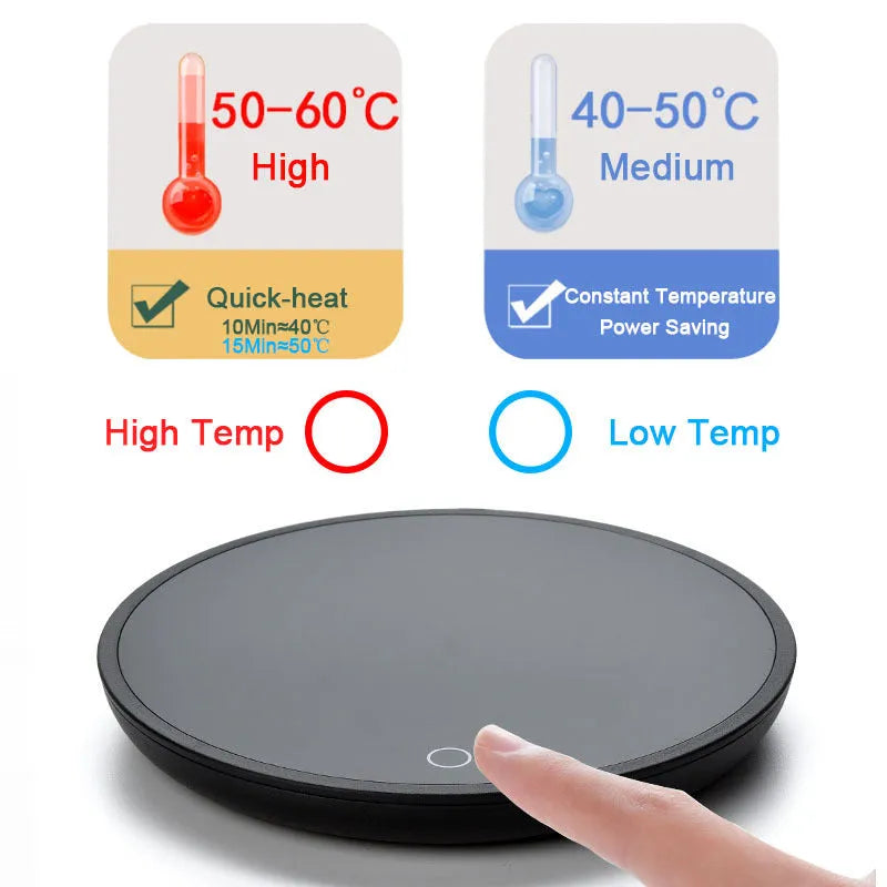 Black circular coffee cup warmer with low and high temperature switch on a desk