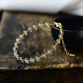 Women's crystal bracelet with 6mm blue moonstone and 14K gold gilded metal detailing