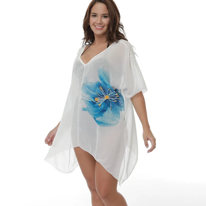 White loose-fitting plus-size beach cover-up blouse for women.