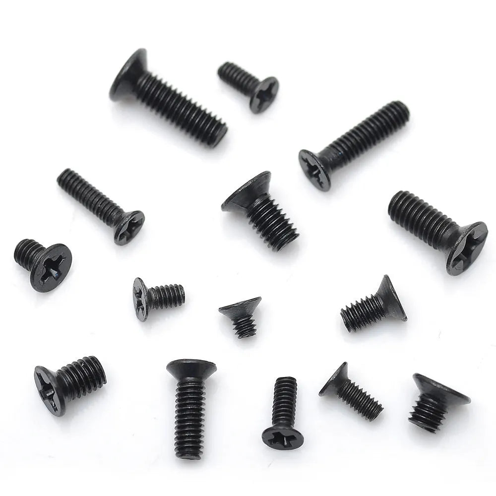 Black laptop repair screw set with countersunk head machine screws on a white background.