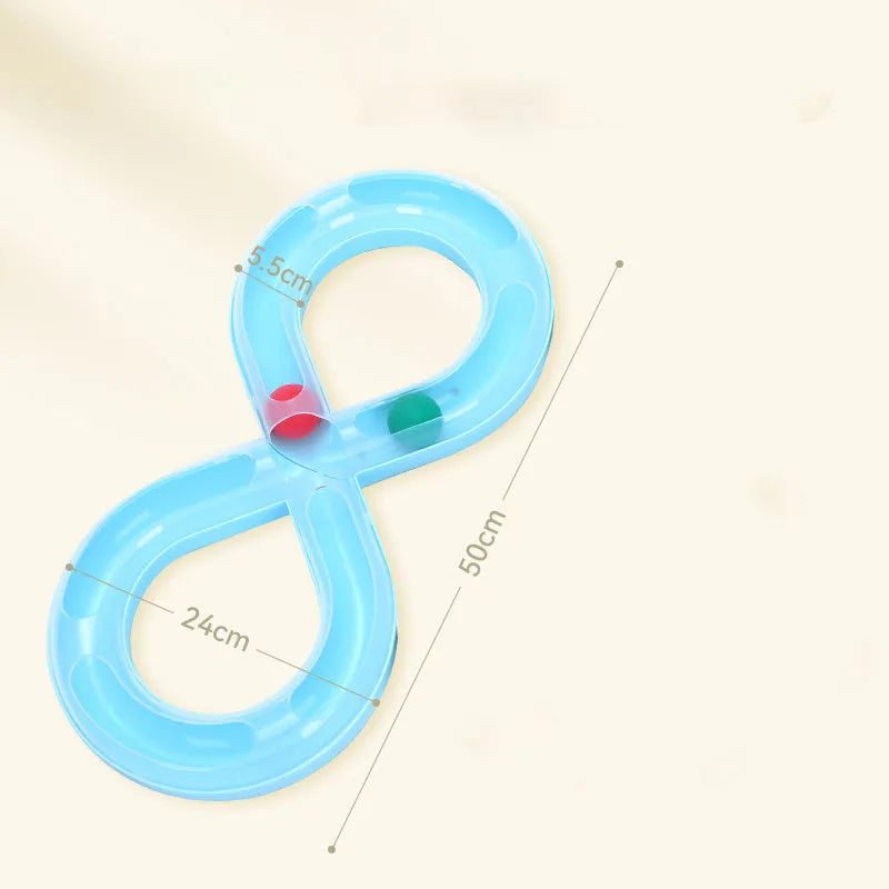 Blue and white cat turntable track ball toy with teasing stick attachment on flat surface