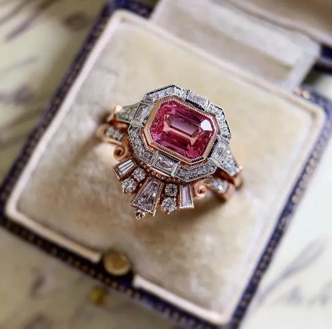 Women's retro style fashion ring with ruby detail and rose gold colour geometric design