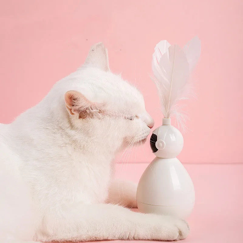 ABS tumbler cat toy with feather attachment and 3 feather replacements in white, yellow, and pink