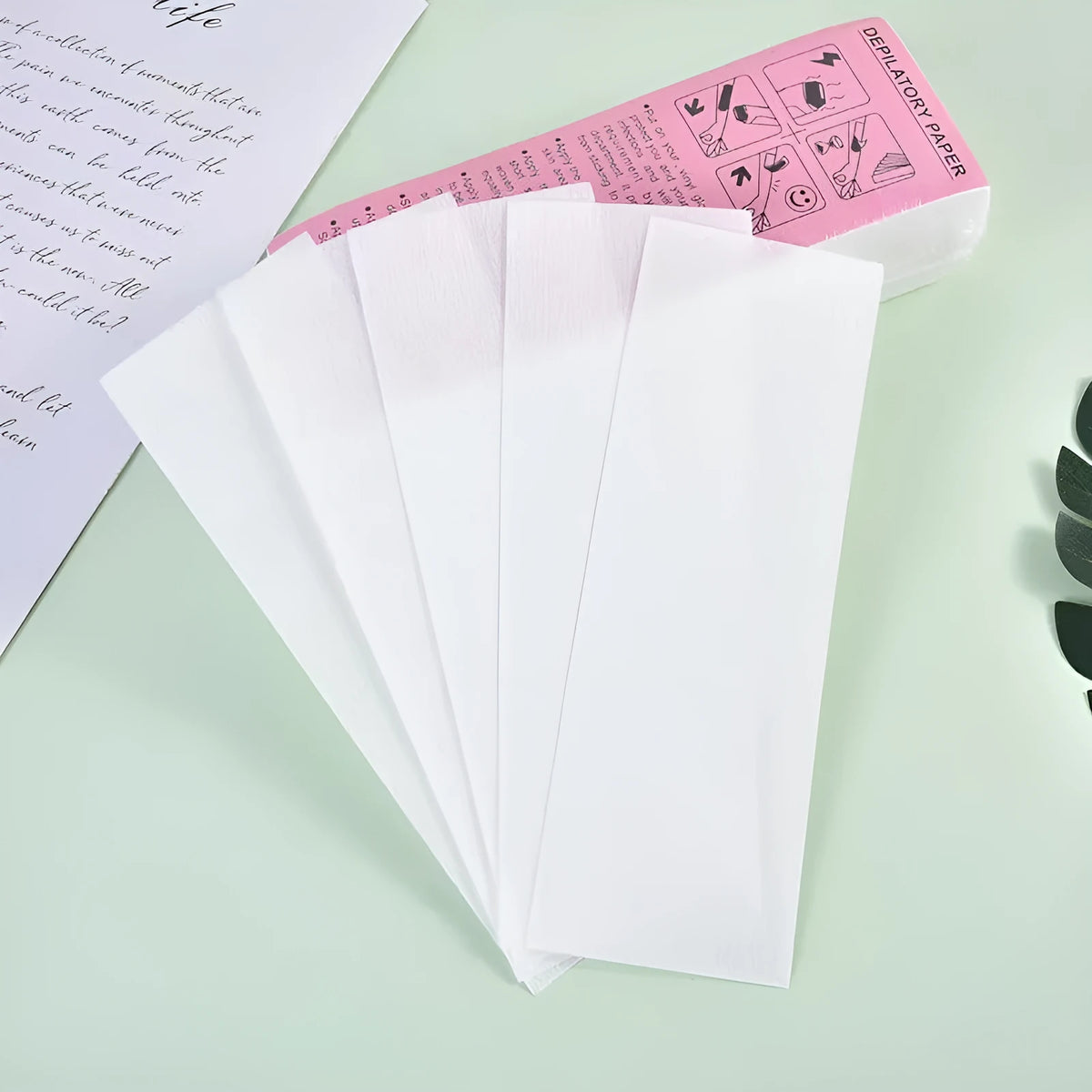 Non-woven fabric hair removal wax paper strips in 50 or 100 piece pack options