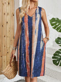 V-neck sleeveless dress with striped color block pattern in midi length