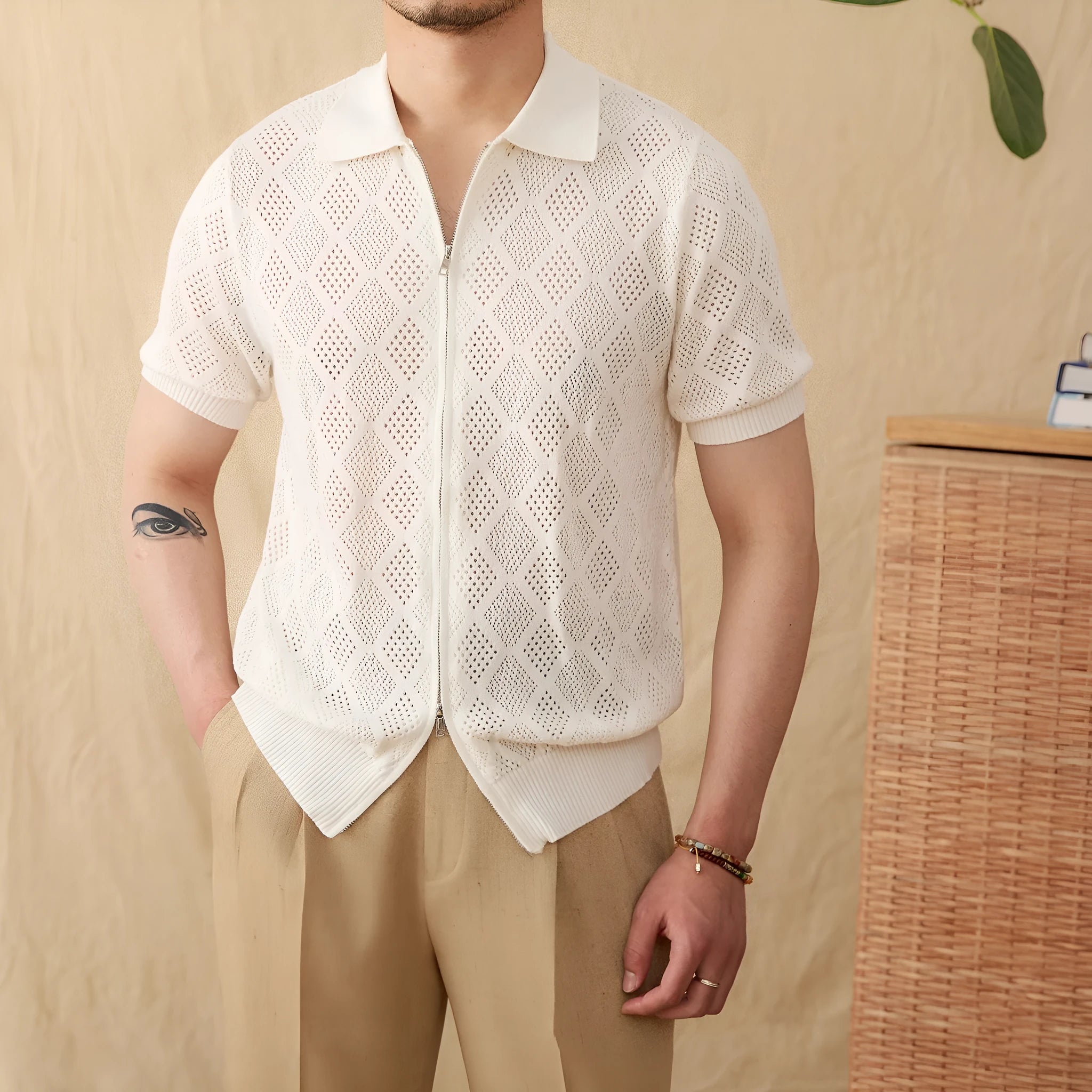 Light brown cotton cardigan with front zipper and lapel collar showing short sleeve design
